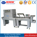 Tray shrink film packing equipment